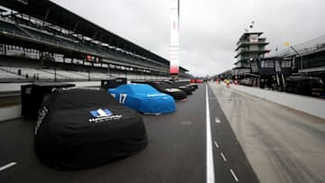 INDIANAPOLIS, IN - SEPTEMBER 09: Cars are seen covered on pit road prior to the Monster Energy NASCAR Cup Series Big Machine Vodka 400 at the Brickyard at Indianapolis Motor Speedway on September 9, 2018 in Indianapolis, Indiana. (Photo by Sean Gardner/Getty Images)