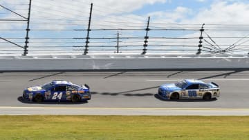 Feb 21, 2016; Daytona Beach, FL, USA; NASCAR Sprint Cup Series driver Chase Elliott (24) leads Dale Earnhardt Jr. (88) during the Daytona 500 at Daytona International Speedway. Mandatory Credit: Jasen Vinlove-USA TODAY Sports