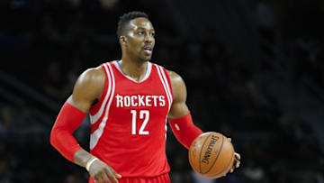 Nov 30, 2015; Auburn Hills, MI, USA; Houston Rockets center Dwight Howard (12) dribbles the ball during the fourth quarter against the Detroit Pistons at The Palace of Auburn Hills. Pistons win 116-105. Mandatory Credit: Raj Mehta-USA TODAY Sports