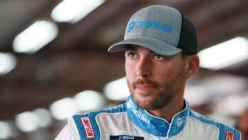TALLADEGA, ALABAMA - OCTOBER 11: Ross Chastain, driver of the #45 CarShield Chevrolet, stands in the garage area during practice for the NASCAR Gander Outdoor Truck Series Sugarlands Shine 250 at Talladega Superspeedway on October 11, 2019 in Talladega, Alabama. (Photo by Sean Gardner/Getty Images)
