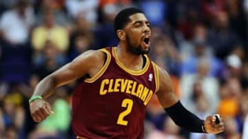 Mar 12, 2014; Phoenix, AZ, USA; Cleveland Cavaliers guard Kyrie Irving (2) reacts on the court against the Phoenix Suns in the second half at US Airways Center. The Cavaliers won 110-101. Mandatory Credit: Jennifer Stewart-USA TODAY Sports