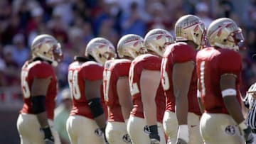 TALLAHASSEE, FL - NOVEMBER 25: The Florida State Seminoles offensive line gets ready during the game against the Florida Gators on November 25, 2006 at Doak Campbell Stadium in Tallahassee, Florida. (Photo by Marc Serota/Getty Images)