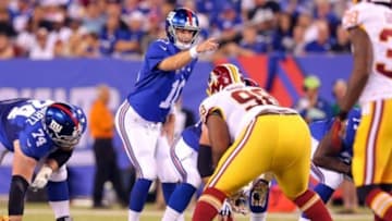 Sep 24, 2015; East Rutherford, NJ, USA; New York Giants quarterback Eli Manning (10) calls a play at the line against the Washington Redskins during the second quarter at MetLife Stadium. Mandatory Credit: Brad Penner-USA TODAY Sports