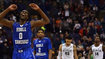 Mar 18, 2016; St. Louis, MO, USA; Middle Tennessee Blue Raiders forward Darnell Harris (0) reacts after the game against the Michigan State Spartans in the first round in the 2016 NCAA Tournament at Scottrade Center. Middle Tennessee State won 90-81. Mandatory Credit: Jasen Vinlove-USA TODAY Sports