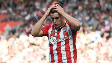 Southampton's English defender Tino Livramento reacts after failing to score during the English Premier League football match between Southampton and Wolverhampton Wanderers at St Mary's Stadium in Southampton, southern England on September 26, 2021. - RESTRICTED TO EDITORIAL USE. No use with unauthorized audio, video, data, fixture lists, club/league logos or 'live' services. Online in-match use limited to 120 images. An additional 40 images may be used in extra time. No video emulation. Social media in-match use limited to 120 images. An additional 40 images may be used in extra time. No use in betting publications, games or single club/league/player publications. (Photo by Glyn KIRK / AFP) / RESTRICTED TO EDITORIAL USE. No use with unauthorized audio, video, data, fixture lists, club/league logos or 'live' services. Online in-match use limited to 120 images. An additional 40 images may be used in extra time. No video emulation. Social media in-match use limited to 120 images. An additional 40 images may be used in extra time. No use in betting publications, games or single club/league/player publications. / RESTRICTED TO EDITORIAL USE. No use with unauthorized audio, video, data, fixture lists, club/league logos or 'live' services. Online in-match use limited to 120 images. An additional 40 images may be used in extra time. No video emulation. Social media in-match use limited to 120 images. An additional 40 images may be used in extra time. No use in betting publications, games or single club/league/player publications. (Photo by GLYN KIRK/AFP via Getty Images)
