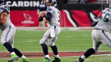 Jan 3, 2016; Glendale, AZ, USA; Seattle Seahawks quarterback Russell Wilson (3) looks to throw during the first half against the Arizona Cardinals at University of Phoenix Stadium. Mandatory Credit: Matt Kartozian-USA TODAY Sports
