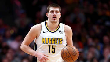 DENVER, CO - APRIL 03: Nikola Jokic #15 of the Denver Nuggets brings the ball down the court against the Indiana Pacers at the Pepsi Center on April 3, 2018 in Denver, Colorado. (Photo by Matthew Stockman/Getty Images)