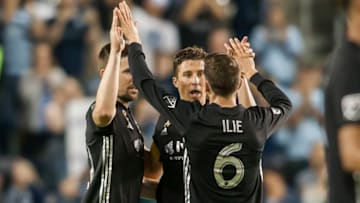 KANSAS CITY, KS - SEPTEMBER 08: Sporting Kansas City defender Matt Besler (5), Sporting Kansas City midfielder Ilie Sanchez (6) and Sporting Kansas City Defender Andreu Fontas (30) celebrate after the match between Sporting Kansas City and Orlando City SC on Saturday September 8th, 2018 at Children's Mercy Park in Kansas City, KS. (Photo by Nick Tre. Smith/Icon Sportswire via Getty Images)