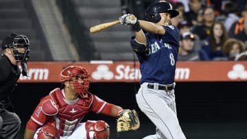 Sep 13, 2016; Anaheim, CA, USA; Seattle Mariners left fielder Nori Aoki (8) follows through on his swing for a solo home run during the second inning against the Los Angeles Angels at Angel Stadium of Anaheim. Mandatory Credit: Richard Mackson-USA TODAY Sports