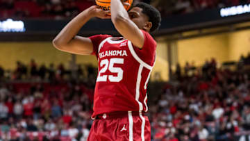 LUBBOCK, TEXAS - JANUARY 07: Guard Grant Sherfield #25 of the Oklahoma Sooners shoots the ball during the first half of the college basketball game against the Texas Tech Red Raiders at United Supermarkets Arena on January 07, 2023 in Lubbock, Texas. (Photo by John E. Moore III/Getty Images)