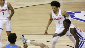 Josh Giddey #3 of the Oklahoma City Thunder injures his ankle as he get tripped up driving against the Detroit Pistons (Photo by Ethan Miller/Getty Images)