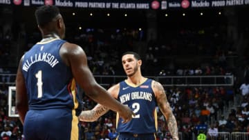 ATLANTA, GA - OCTOBER 7: Lonzo Ball #2 of the New Orleans Pelicans hi-fives Zion Williamson #1 of the New Orleans Pelicans against the Atlanta Hawks during a pre-season game on October 7, 2019 at State Farm Arena in Atlanta, Georgia. NOTE TO USER: User expressly acknowledges and agrees that, by downloading and/or using this Photograph, user is consenting to the terms and conditions of the Getty Images License Agreement. Mandatory Copyright Notice: Copyright 2019 NBAE (Photo by Scott Cunningham/NBAE via Getty Images)