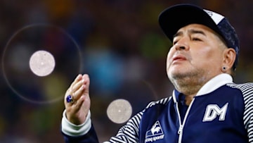 Diego Armando Maradona head coach of Gimnasia y Esgrima La Plata blows a kiss to fans before a match between Boca Juniors and Gimnasia y Esgrima La Plata as part of Superliga 2019/20 at Alberto J. Armando Stadium on March 7, 2020 in Buenos Aires, Argentina. (Photo by Marcos Brindicci/Getty Images)