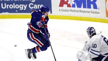 Amerk’s Lukas Rousek tries to avoid this shot on Toronto goalie Joseph Woll.