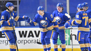 Mar 31, 2021; Buffalo, New York, USA; Buffalo Sabres defenseman Rasmus Ristolainen (55) congratulates center Sam Reinhart (23) after scoring a goal during the first period against the Philadelphia Flyers at KeyBank Center. Mandatory Credit: Mark Konezny-USA TODAY Sports