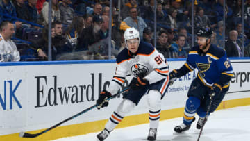 ST. LOUIS, MO - NOVEMBER 21: Jesse Puljujarvi #98 of the Edmonton Oilers controls the puck as Alex Pietrangelo #27 of the St. Louis Blues defends at Scottrade Center on November 21, 2017 in St. Louis, Missouri. (Photo by Scott Rovak/NHLI via Getty Images)