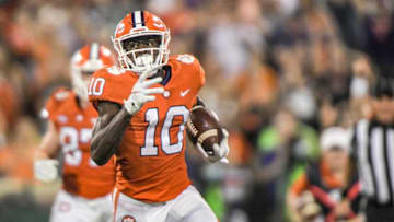 Clemson wide receiver Joseph Ngata (10) gets a first down to set up a 42-yard field goal by kicker B.T. Potter (29) during the fourth quarter at Memorial Stadium in Clemson, S.C., October 2, 2021.Ncaa Football Acc Clemson Boston College