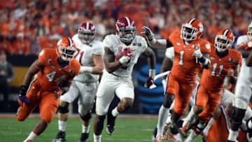 Jan 11, 2016; Glendale, AZ, USA; Alabama Crimson Tide running back Derrick Henry (2) runs for a 50 yard touchdown during the first quarter past Clemson Tigers safety Jayron Kearse (1) in the 2016 CFP National Championship at University of Phoenix Stadium. Mandatory Credit: Kirby Lee-USA TODAY Sports