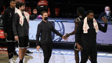 NEW YORK, NEW YORK - DECEMBER 13: Head coach Steve Nash of the Brooklyn Nets high-fives his team during the second half against the Washington Wizards at Barclays Center on December 13, 2020 in the Brooklyn borough of New York City. NOTE TO USER: User expressly acknowledges and agrees that, by downloading and or using this photograph, User is consenting to the terms and conditions of the Getty Images License Agreement. (Photo by Sarah Stier/Getty Images)