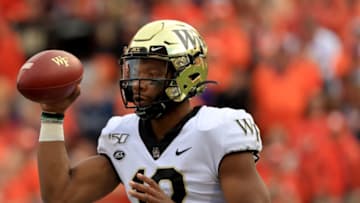 CLEMSON, SOUTH CAROLINA - NOVEMBER 16: Jamie Newman #12 of the Wake Forest Demon Deacons during their game at Memorial Stadium on November 16, 2019 in Clemson, South Carolina. (Photo by Streeter Lecka/Getty Images)