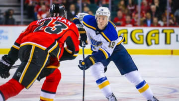 Mar 14, 2016; Calgary, Alberta, CAN; St. Louis Blues defenseman Jay Bouwmeester (19) controls the puck against the Calgary Flames during the third period at Scotiabank Saddledome. Calgary Flames won 7-4. Mandatory Credit: Sergei Belski-USA TODAY Sports