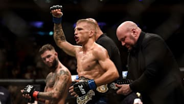 NEW YORK, NY - NOVEMBER 04: (R-L) TJ Dillashaw celebrates his knockout victory over Cody Garbrandt in their UFC bantamweight championship bout during the UFC 217 event inside Madison Square Garden on November 4, 2017 in New York City. (Photo by Brandon Magnus/Zuffa LLC/Zuffa LLC via Getty Images)