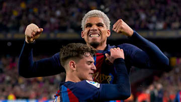 BARCELONA, SPAIN - MARCH 19: Ronald Araujo and Pablo Paez 'Gavi' of FC Barcelona celebrating their team's second goal scored by Franck Kessie (Not in frame) during the LaLiga Santander match between FC Barcelona and Real Madrid CF at Spotify Camp Nou on March 19, 2023 in Barcelona, Spain. (Photo by Pedro Salado/Quality Sport Images/Getty Images)