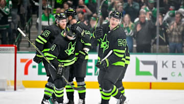 Jan 27, 2023; Dallas, Texas, USA; Dallas Stars center Joe Pavelski (16) and defenseman Miro Heiskanen (4) and center Roope Hintz (24) and left wing Jason Robertson (21) and left wing Jamie Benn (14) celebrates a power play goal scored by Hintz against the New Jersey Devils during the first period at the American Airlines Center. Roope Hintz scores his 100th career NHL goal. Mandatory Credit: Jerome Miron-USA TODAY Sports