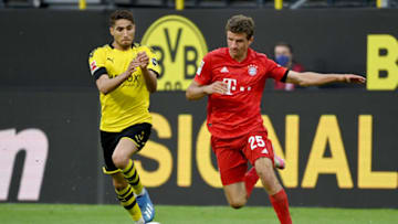 Achraf Hakimi, Borussia Dortmund and Thomas Muller, Bayern Munich. (Photo by Federico Gambarini/Pool via Getty Images)