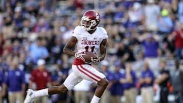 Oct 1, 2016; Fort Worth, TX, USA; Oklahoma Sooners wide receiver Dede Westbrook (11) scores a touchdown during the first half against the TCU Horned Frogs at Amon G. Carter Stadium. Mandatory Credit: Kevin Jairaj-USA TODAY Sports
