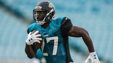 JACKSONVILLE, FL - AUGUST 04: Jacksonville Jaguars running back Leonard Fournette (27) runs with the ball during the Jaguars training camp on August 4, 2017 at Everbank Field in Jacksonville, Fl. (Photo by David Rosenblum/Icon Sportswire via Getty Images)