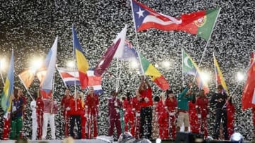 Aug 12, 2012; London, United Kingdom; Flag bearers enter the stadium during the Closing Ceremony for the London 2012 Olympic Games at Olympic Stadium. Mandatory Credit: Rob Schumacher-USA TODAY Sports