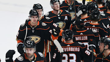 ANAHEIM, CA - JANUARY 29: Anaheim Ducks center Derek Grant (38) on the ice with his teammates after the Ducks defeated the Arizona Coyotes 4 to 2 in a game played on January 29, 2020 at the Honda Center in Anaheim, CA. (Photo by John Cordes/Icon Sportswire via Getty Images)