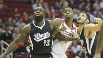 Dec 5, 2015; Houston, TX, USA; Sacramento Kings forward Quincy Acy (13) and forward Omri Casspi (18) box out Houston Rockets forward Terrence Jones (6) in the first quarter at Toyota Center. Mandatory Credit: Thomas B. Shea-USA TODAY Sports