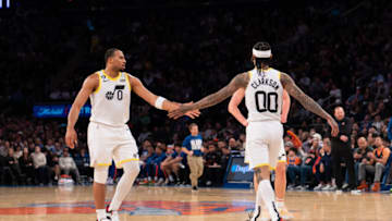 NEW YORK, NY - FEBRUARY 11: Talen Horton-Tucker #0 and Jordan Clarkson #00 of the Utah Jazz high five during the fourth quarter against the New York Knicks at Madison Square Garden on February 11, 2023 in New York City. NOTE TO USER: User expressly acknowledges and agrees that, by downloading and or using this photograph, User is consenting to the terms and conditions of the Getty Images License Agreement. (Photo by Evan Yu/Getty Images)