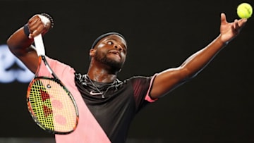 MELBOURNE, AUSTRALIA - JANUARY 16: Frances Tiafoe of the US serves in his first round match against Juan Martin del Potro of Argentina on day two of the 2018 Australian Open at Melbourne Park on January 16, 2018 in Melbourne, Australia. (Photo by Michael Dodge/Getty Images)