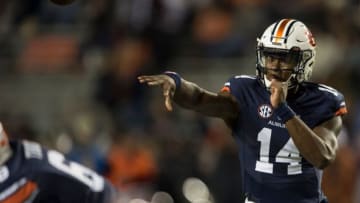 Auburn football quarterback Malik Willis (14) throws the ball down field against Liberty at Jordan-Hare Stadium in Auburn, Ala., on Saturday, Nov.. 17, 2018. Auburn defeated Liberty 53-0.