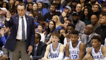 Duke basketball head coach Mike Krzyzewski makes a point to his squad from the bench. (Photo by Bob Leverone/Getty Images)