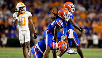 Sep 16, 2023; Gainesville, Florida, USA; Florida Gators cornerback Jaydon Hill (23) and Florida Gators linebacker Scooby Williams (17) celebrates while Tennessee Volunteers wide receiver Squirrel White (10) looks on during the first half at Ben Hill Griffin Stadium. Mandatory Credit: Matt Pendleton-USA TODAY Sports