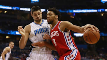Feb 28, 2016; Orlando, FL, USA; Philadelphia 76ers center Jahlil Okafor (8) drives to the basket as Orlando Magic center Nikola Vucevic (9) defends during the first quarter at Amway Center. Mandatory Credit: Kim Klement-USA TODAY Sports