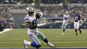 Aug 16, 2014; Arlington, TX, USA; Dallas Cowboys receiver Dez Bryant (88) catches a touchdown pass in the first quarter against the Baltimore Ravens at AT&T Stadium. Mandatory Credit: Matthew Emmons-USA TODAY Sports