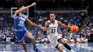 Cincinnati Bearcats guard Mike Adams-Woods drives against the Memphis Tigers at FedExForum. Getty Images.
