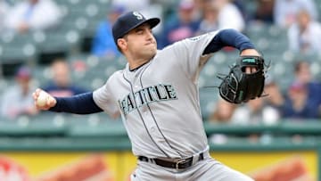 Apr 21, 2016; Cleveland, OH, USA; Seattle Mariners starting pitcher Nathan Karns (13) throws a pitch during the first inning against the Cleveland Indians at Progressive Field. Mandatory Credit: Ken Blaze-USA TODAY Sports