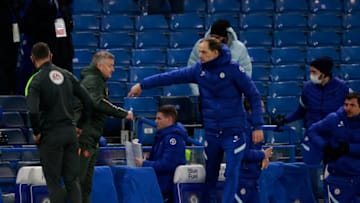 LONDON, ENGLAND - FEBRUARY 28: Thomas Tuchel, Manager of Chelsea interacts with Ole Gunnar Solskjaer, Manager of Manchester United following the Premier League match between Chelsea and Manchester United at Stamford Bridge on February 28, 2021 in London, England. Sporting stadiums around the UK remain under strict restrictions due to the Coronavirus Pandemic as Government social distancing laws prohibit fans inside venues resulting in games being played behind closed doors. (Photo by Ian Walton - Pool/Getty Images)
