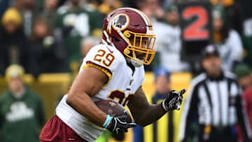 GREEN BAY, WISCONSIN - DECEMBER 08: Derrius Guice #29 of the Washington Redskins runs for yards during a game against the Green Bay Packers at Lambeau Field on December 08, 2019 in Green Bay, Wisconsin. The Packers defeated the Redskins 20-15. (Photo by Stacy Revere/Getty Images)