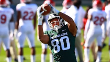 EAST LANSING, MI - OCTOBER 24: Ian Stewart #80 of the Michigan State Spartans makes a catch during warm ups prior to a game against the Rutgers Scarlet Knights at Spartan Stadium on October 24, 2020 in East Lansing, Michigan. (Photo by Rey Del Rio/Getty Images)