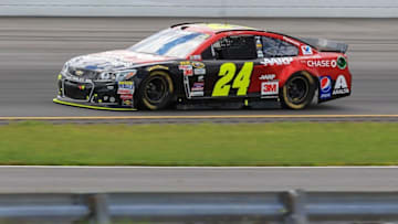 Aug 2, 2015; Long Pond, PA, USA; NASCAR Sprint Cup Series driver Jeff Gordon (24) races during the Windows 10 400 at Pocono Raceway. Mandatory Credit: Matthew O