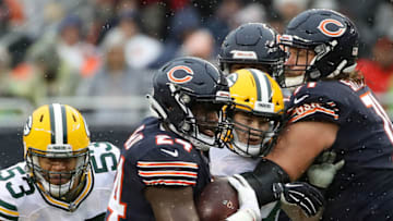 CHICAGO, IL - NOVEMBER 12: Jordan Howard #24 of the Chicago Bears carries the football past Nick Perry #53 of the Green Bay Packers in the first quarter at Soldier Field on November 12, 2017 in Chicago, Illinois. (Photo by Jonathan Daniel/Getty Images)