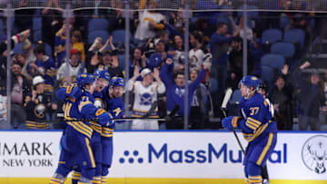 Apr 5, 2022; Buffalo, New York, USA; Buffalo Sabres left wing Victor Olofsson (71) celebrates his goal with teammates during the third period against the Carolina Hurricanes at KeyBank Center. Mandatory Credit: Timothy T. Ludwig-USA TODAY Sports