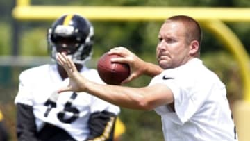 Jun 17, 2014; Pittsburgh, PA, USA; Pittsburgh Steelers quarterback Ben Roethlisberger (7) participates in drills during minicamp at the UPMC Sports Performance Complex. Mandatory Credit: Charles LeClaire-USA TODAY Sports
